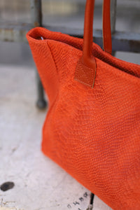 Sac à main orange effet croco en cuir