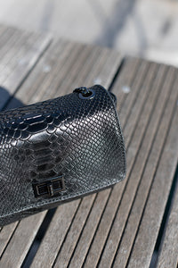 Sac à bandoulière vert effet croco